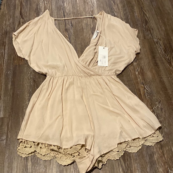 Naked Zebra Dresses & Skirts - Cream Romper